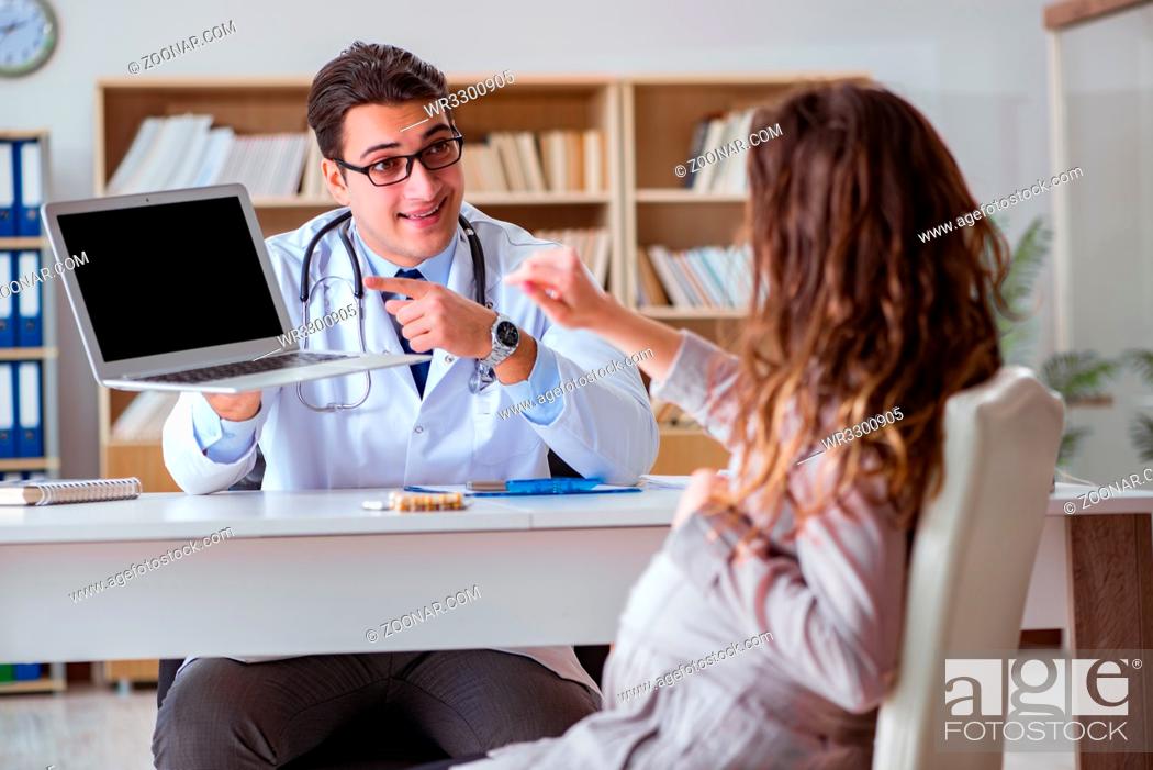 Stock Photo: Pregnant woman visiting doctor for consultation.