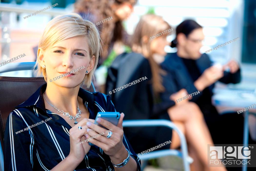 Stock Photo: Businesswoman using smart phone.