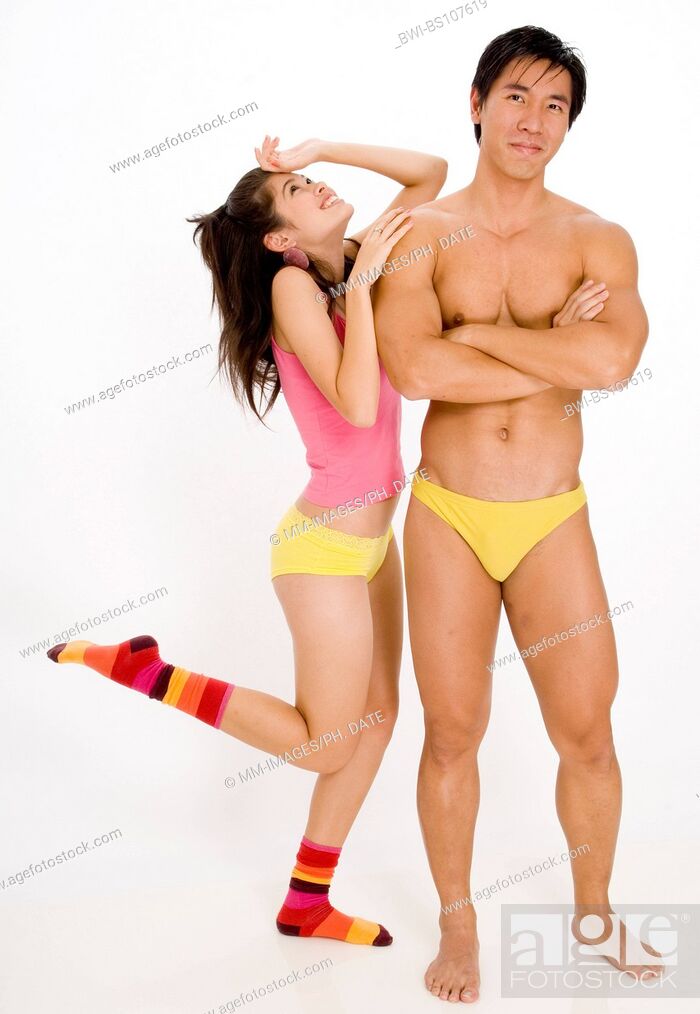 Woman holding man's underwear Stock Photo