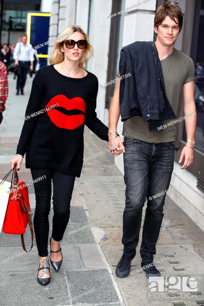 Stock Photo: Celebrities at BBC Radio 1 - Fearne Cotton with Jesse Wood leaving the BBC in Portland Place after hosting her morning show on Radio 1 on her birthday.
