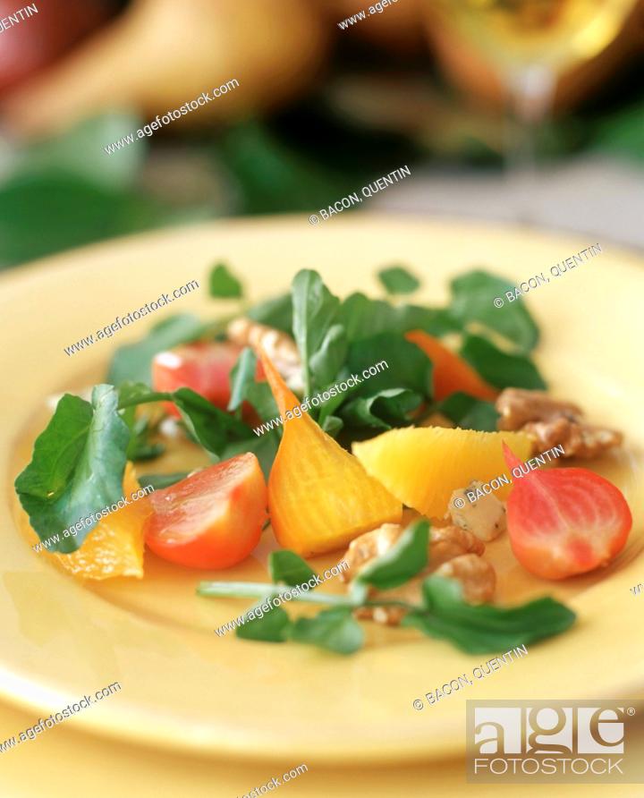 Stock Photo: Salad with yellow beetroot, nuts and orange segments.