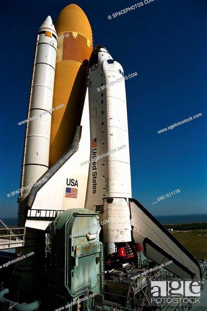Stock Photo: 12/19/1997 --- The Space Shuttle Endeavour rolls out to Launch Pad 39A, the destination of its 3.4-mile journey from the Vehicle Assembly Building.