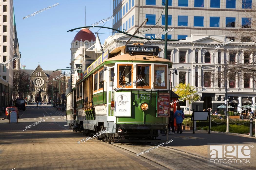 Stock Photo: Christchurch Canterbury South Island New Zealand  City Loop green tram giving sightseeing tours to tourists on tramway circuit near city centre.