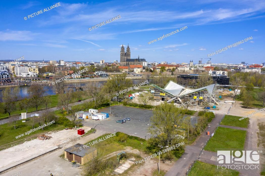 Stock Photo: 27 April 2021, Saxony-Anhalt, Magdeburg: View of the Hyparschale in Magdeburg. The listed building is currently being renovated.