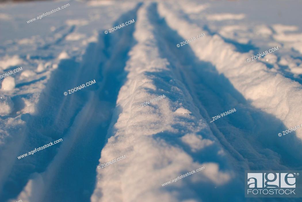 Stock Photo: Beautiful winter landscape with snow-covered hills at sunset.