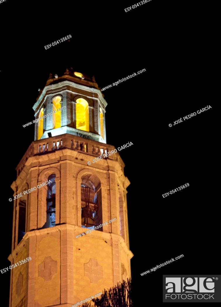 Stock Photo: Night view of the illuminated tower of Santa Maria baroque church in Cubelles, Barcelona, Catalonia, Spain.
