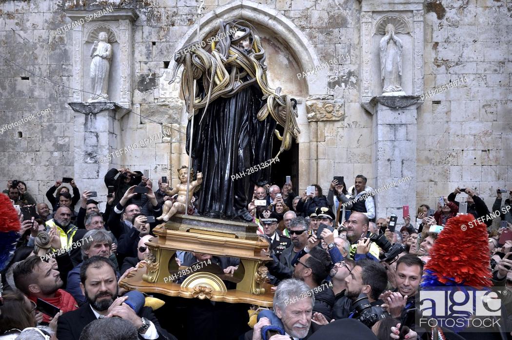 Stock Photo: After two years of interruption due to the pandemic, the procession of snakes in Cocullo takes place on 1 May 2022.The Statue of Saint Domenico inside the.