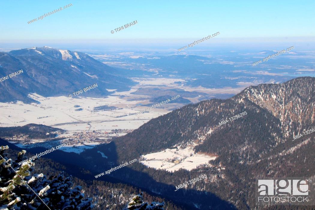 Stock Photo: Winter hike through the mountain forest to the Simetsberg. Germany, Bavaria, Walchensee, Einsiedl, mountain view of Eschenlohe and the Murnauer Moos.