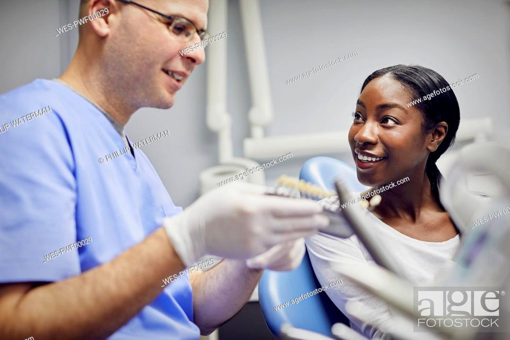 Stock Photo: Patient getting dental teeth whitening treatment.
