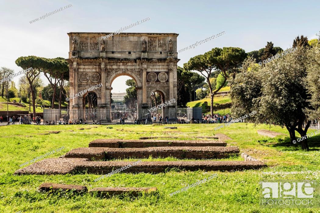 Stock Photo: The Arch of Constantine Arco di Costantino is located in front of the Colosseum. It has three archways. The arch spans the Via Triumphalis.