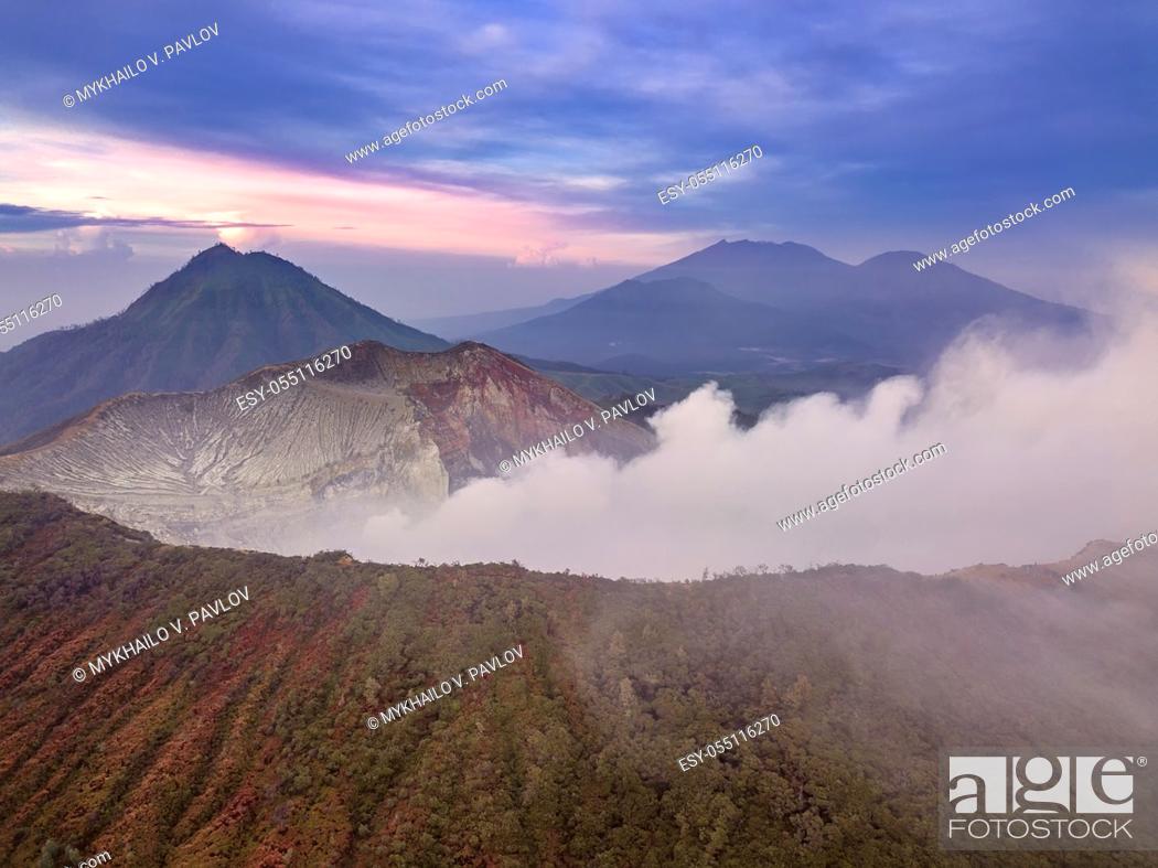 Stock Photo: Indonesia. Java Island. Early morning over the active sulfur volcano Ijen. Aerial view.