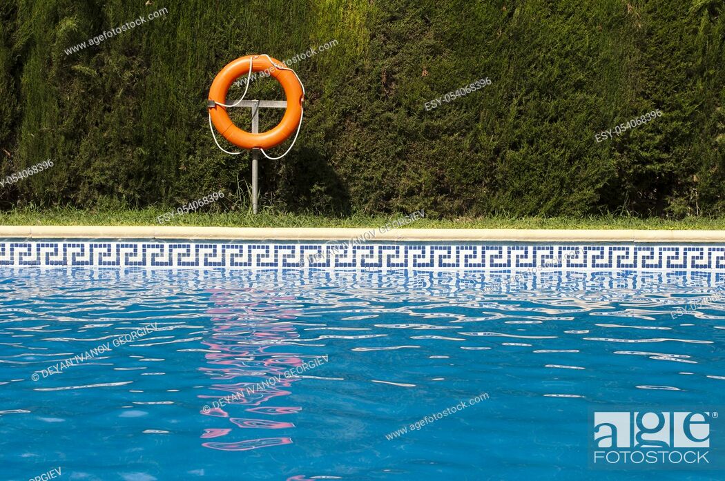 Photo de stock: Buoy and swimming pool.