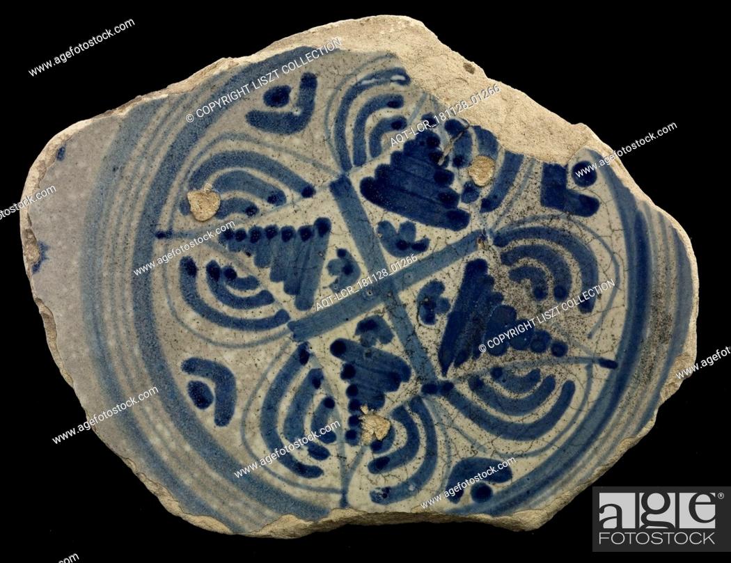 Stock Photo: Fragment majolica plate, blue on white, with plume motif or brush strokes, plate dish crockery holder soil find ceramic earthenware enamel.