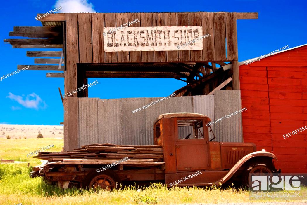 Stock Photo: Old Truck and Blacksmith Shop.