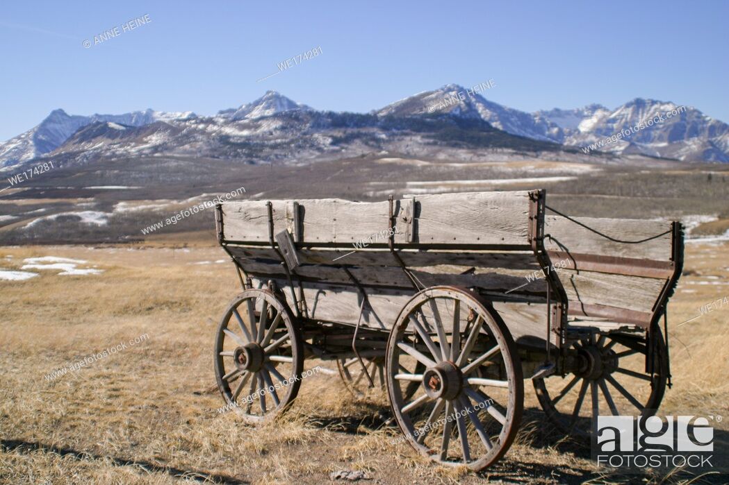 Stock Photo: old abandoned carriage in the foothills of canadian rockies, canada, alberta, .