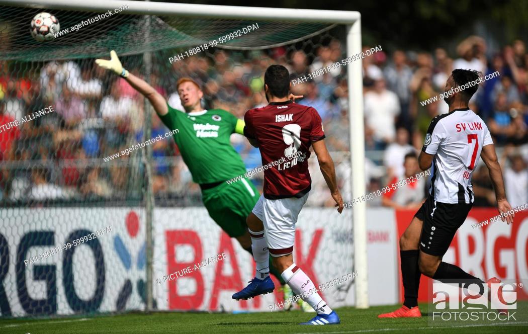 Stock Photo: 18 August 2018, Germany, Kehl: Soccer, DFB Cup, 1st round, SV Linx vs 1st FC Nuremberg, in the Rheinstadion. Mikael Ishak (c) from Nuremberg scores the 0:1.