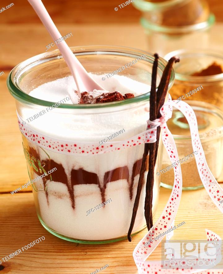 Stock Photo: Christmas sugar layered with spices in a mason jar.