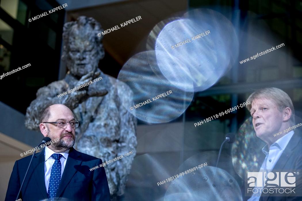 Stock Photo: Martin Schulz, leader of the German Social Democratic Party, talks next to Reiner Hoffmann, chairman of the DGB, during a press conference at the SPD.