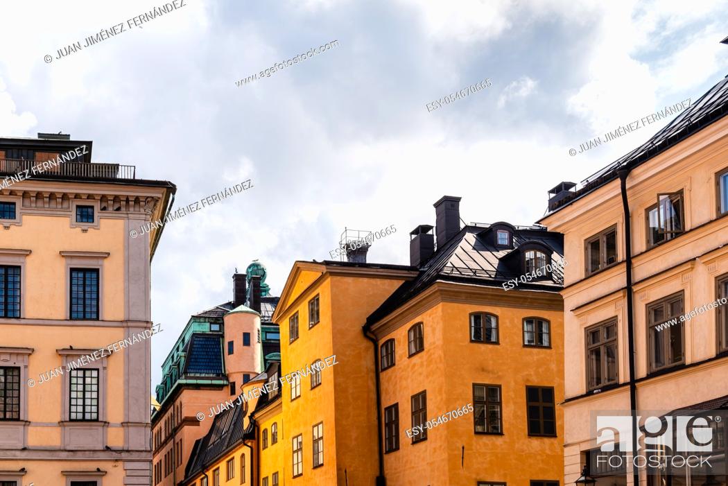 Stock Photo: Low angle view of old buildings in Gamla Stan, the Old Medieval Town of Stockholm.