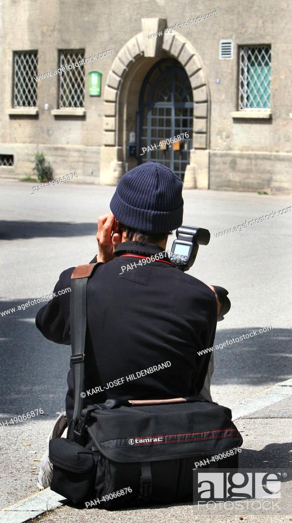 Stock Photo: A photographer waits in front of the prison in Landsberg am Lech, Germany, 02 June 2014. According to media reports on 02 June 2014, Hoeness.