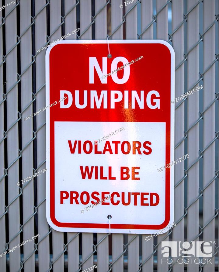 Stock Photo: No dumping violators will be prosecuted sign spotted in downtown Salt Lake City.