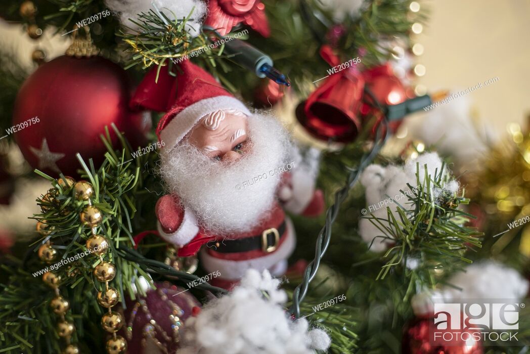 Stock Photo: Detail of Santa claus Christmas decorations on the Christmas tree.