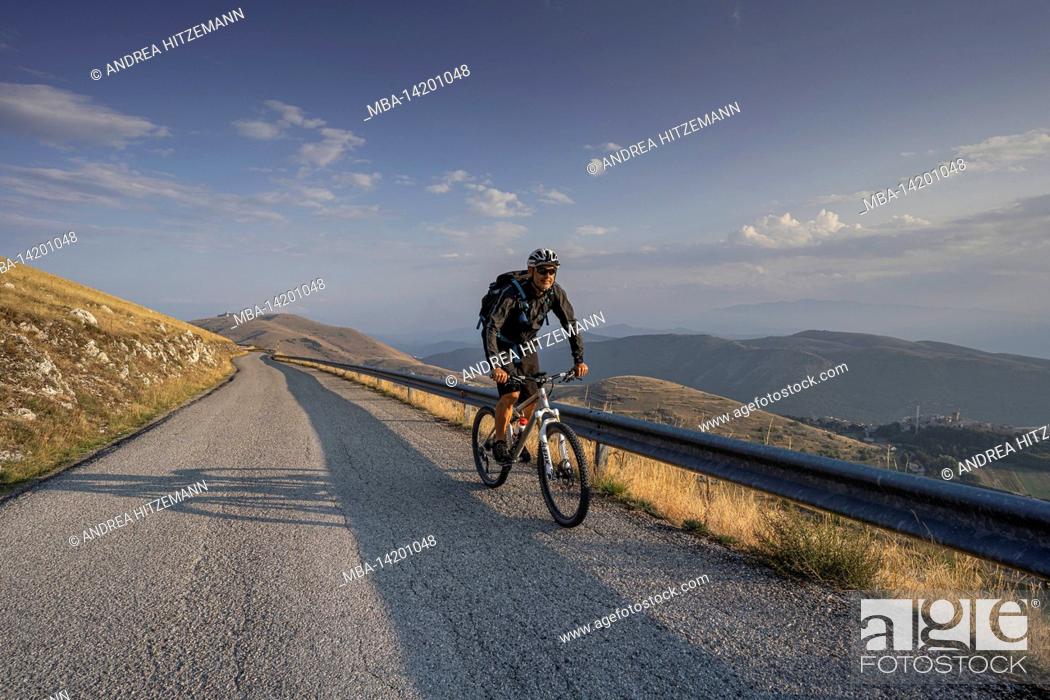 Stock Photo: Mountain bikers on a mountain road near Santo Stefano di Sessiano, Abruzzo, Italy.
