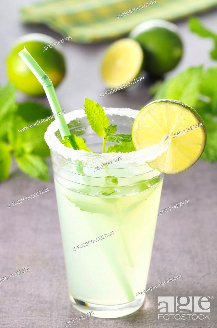 Stock Photo: A Mojito (cocktail made with rum, lime juice and mint leaves).