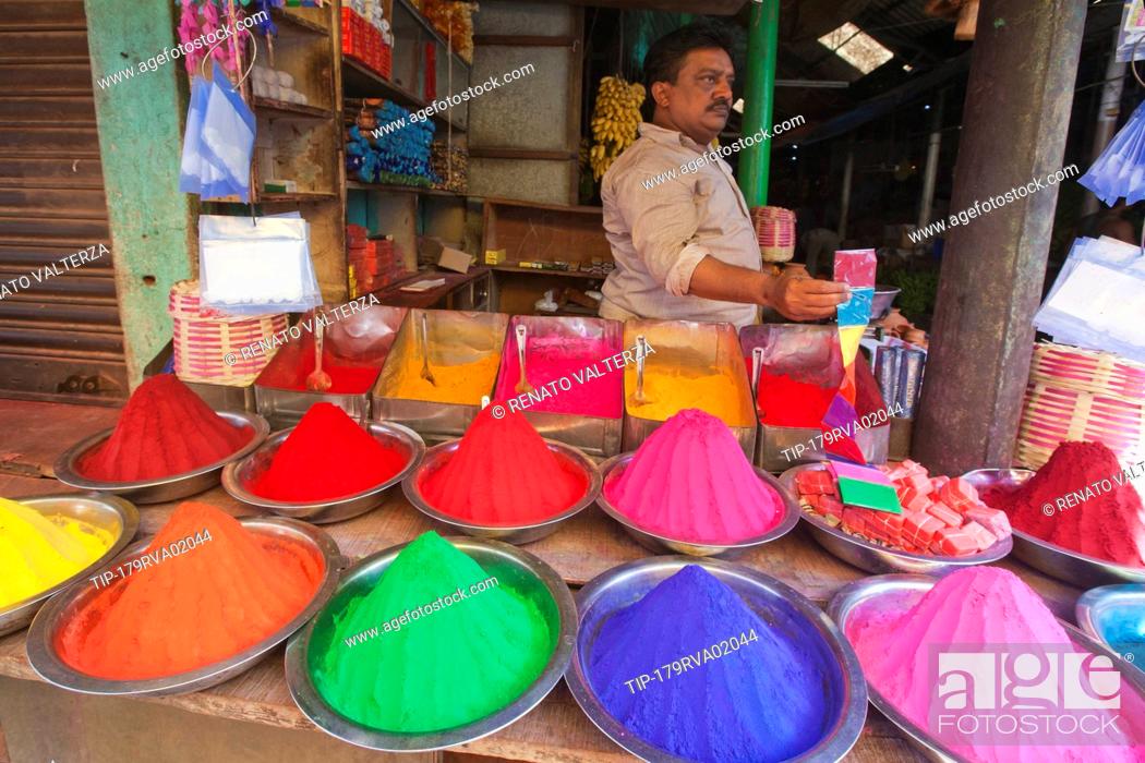 Stock Photo: India, Karnataka, Mysore, coloured kumkum powder for sale in Devaraja market.