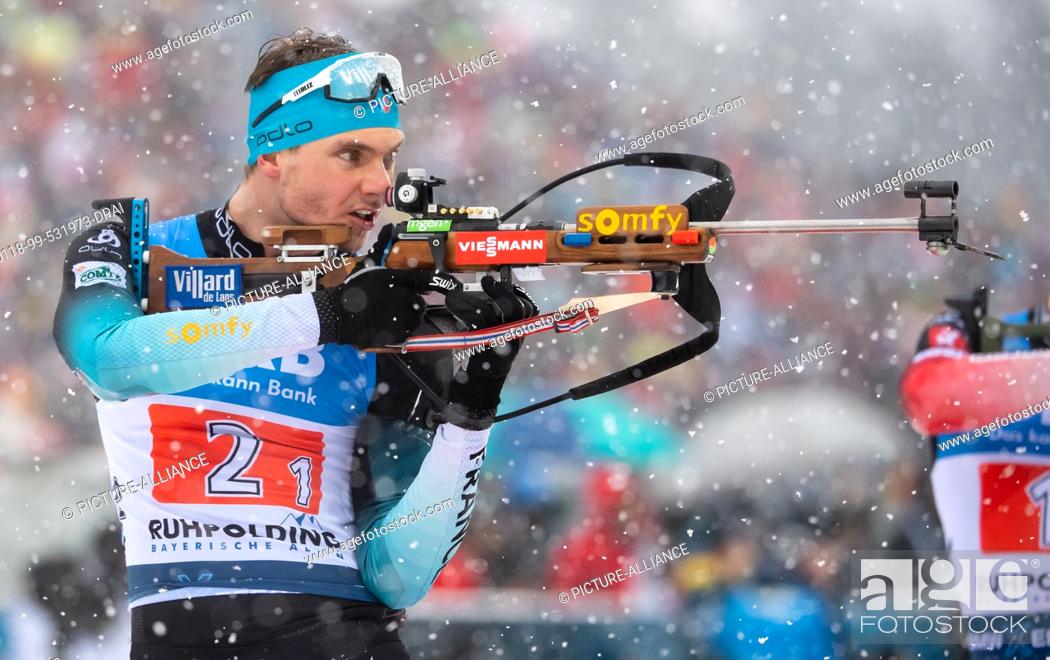 Stock Photo: 18 January 2020, Bavaria, Ruhpolding: Biathlon: World Cup, relay 4 x 7.5 km, men in the Chiemgau Arena. Emilien Jacquelin from France in action.