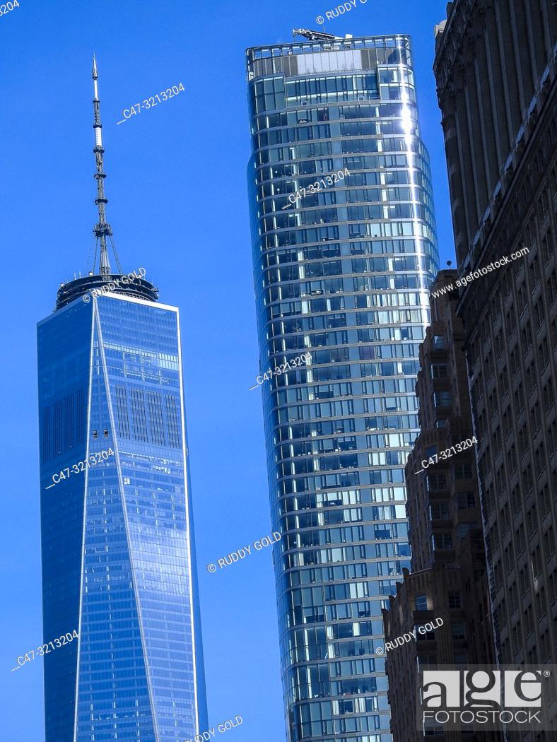 Stock Photo: One World Trade Center (also known as One WTC, 1 World Trade Center, 1 WTC, or Freedom Tower. New York City, US. Is the main building of the rebuilt World Trade.