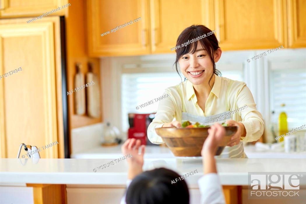 Stock Photo: Japanese family at home.