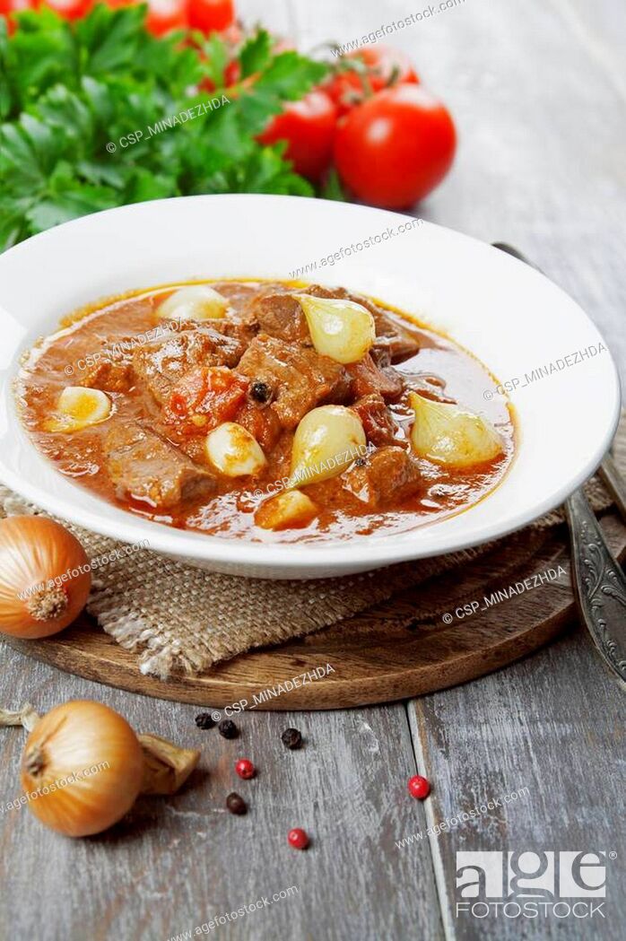 Stock Photo: Stewed beef with onions and tomatoes, stifado.