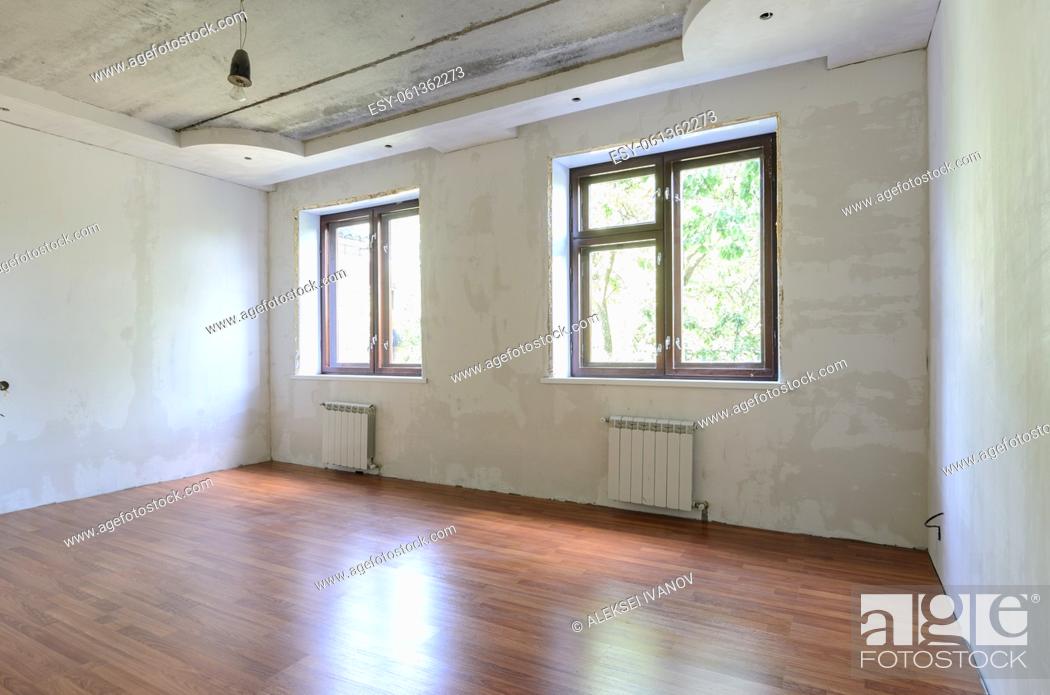 Stock Photo: Empty room interior, wall view with windows.