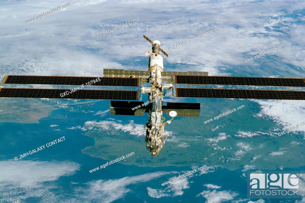 Stock Photo: This high-angle view is one of a series of digital still camera photographs showing the International Space Station (ISS) during a fly-around by the Space.