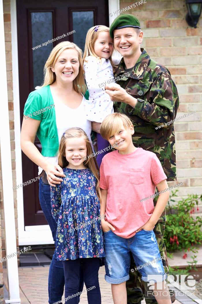Stock Photo: Portrait Of Family With Army Father Home On Leave.