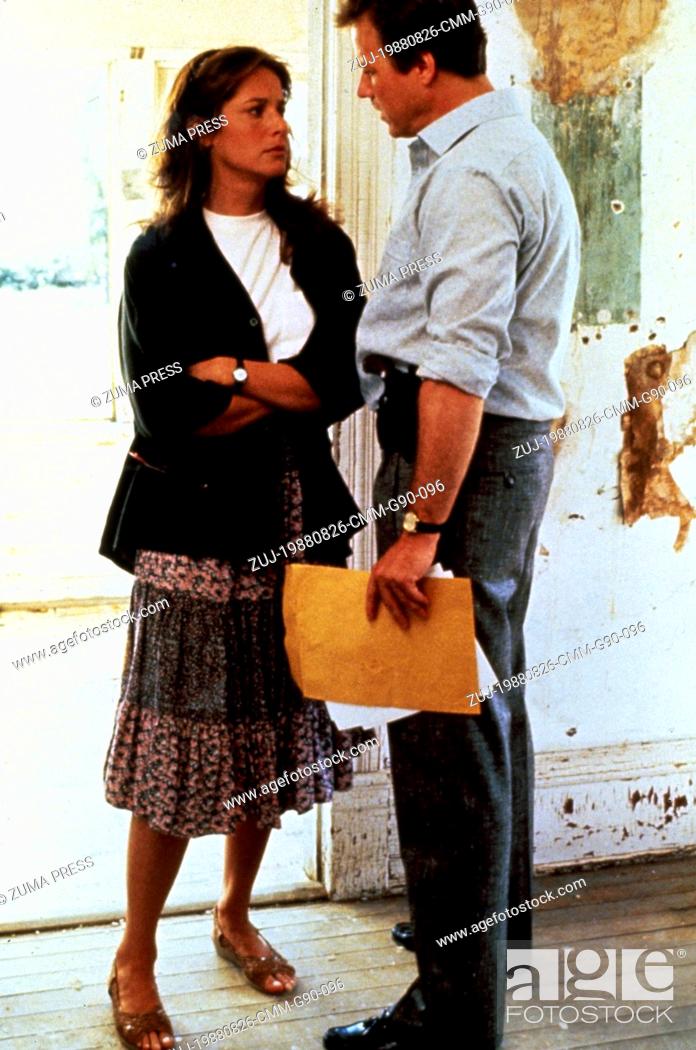 Stock Photo: Aug 26, 1988; Calgary, Alberta, CANADA; DEBRA WINGER as Katie Phillips/Cathy Weaver and JOHN HEARD as Michael 'Mike' Carnes in the romantic, action.