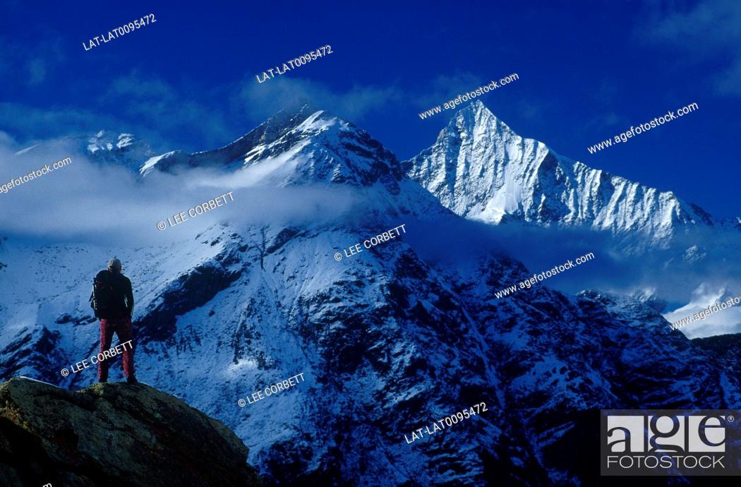 Stock Photo: Zermatt valley. Peak, snow covered mountains. Climber.