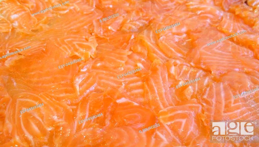 Stock Photo: Platter of fresh organic sliced lox (smoked salmon).