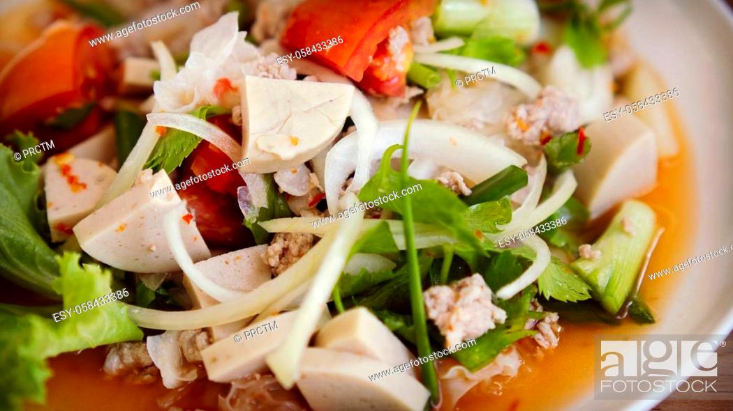 Stock Photo: spicy vietnamese sausage salad Thai street food.