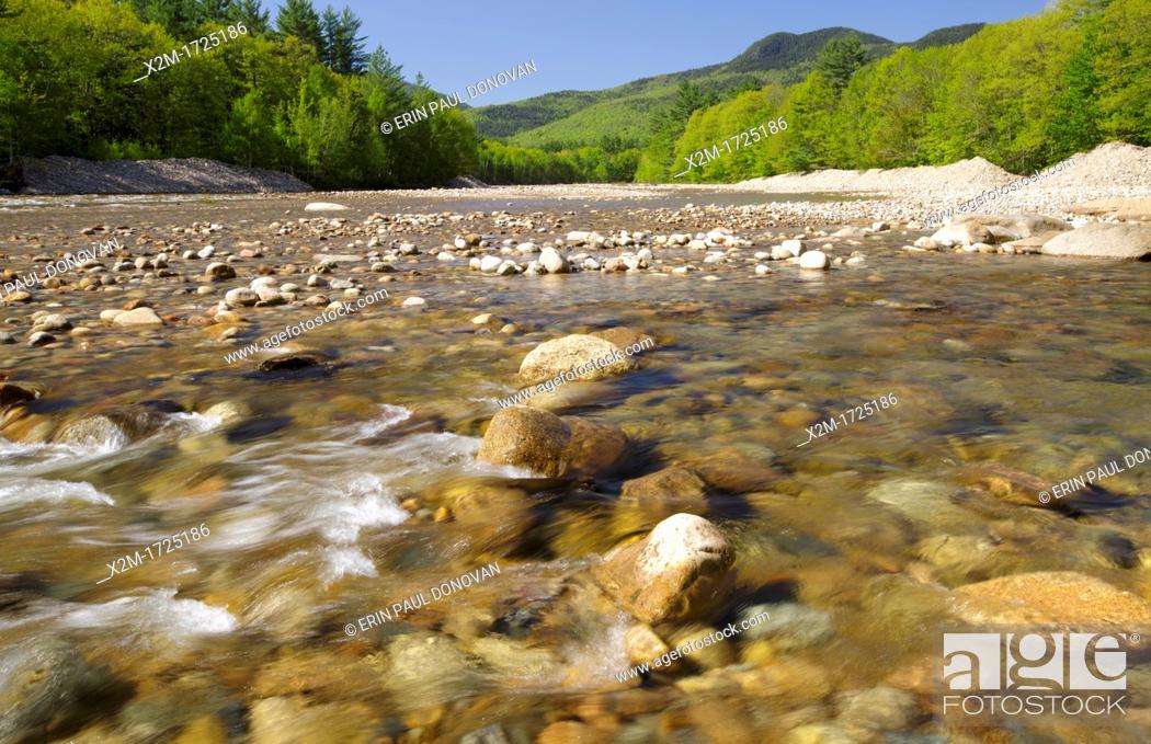 Stock Photo: Saco River in the White Mountains, New Hampshire USA during the spring months  In 2011, Tropical Storm Irene caused major erosion and damage along the Saco.