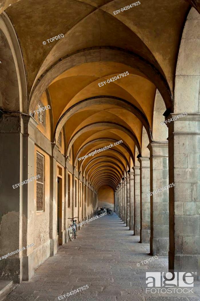 Stock Photo: An arched passageway building in the town of Lucca, Italy.