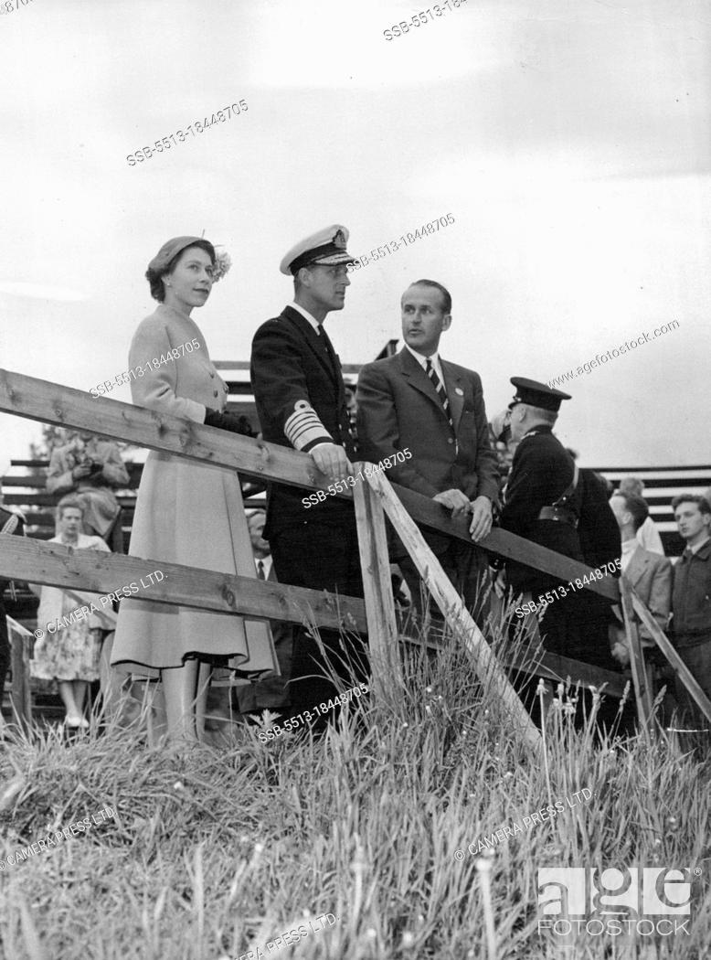 Stock Photo: Royal Visit To Norway -- The Queen and the Duke of Edinburgh a the world famous Holmenkollen ski jump. To the right of the Duke, the guide.