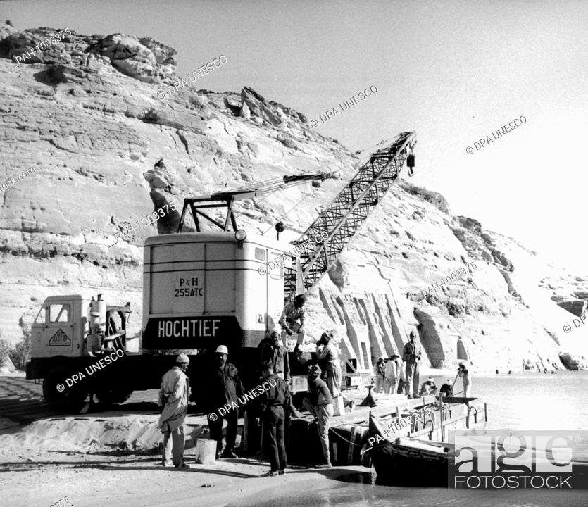 Stock Photo: A construction machine of the German company Hochtief in Essen working in front of the Nefertari temple of Abu Simbel. (Recording from the 60s).