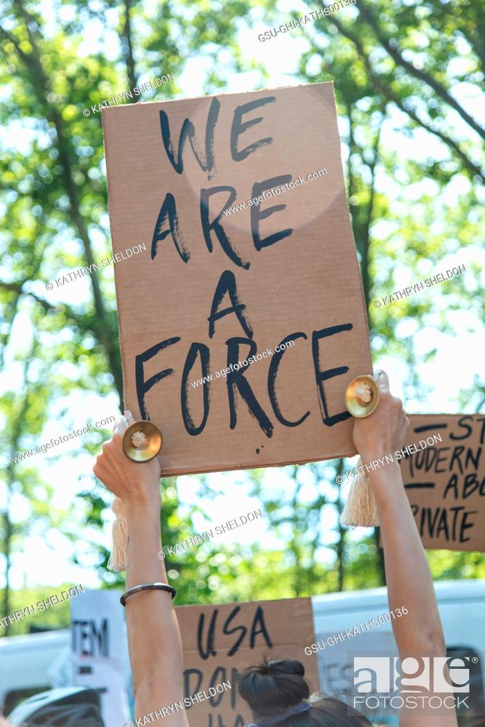 Stock Photo: Protester Holding up Sign, We are a Force at Black Lives Matter March, McCarron Park, Brooklyn, New York, USA.