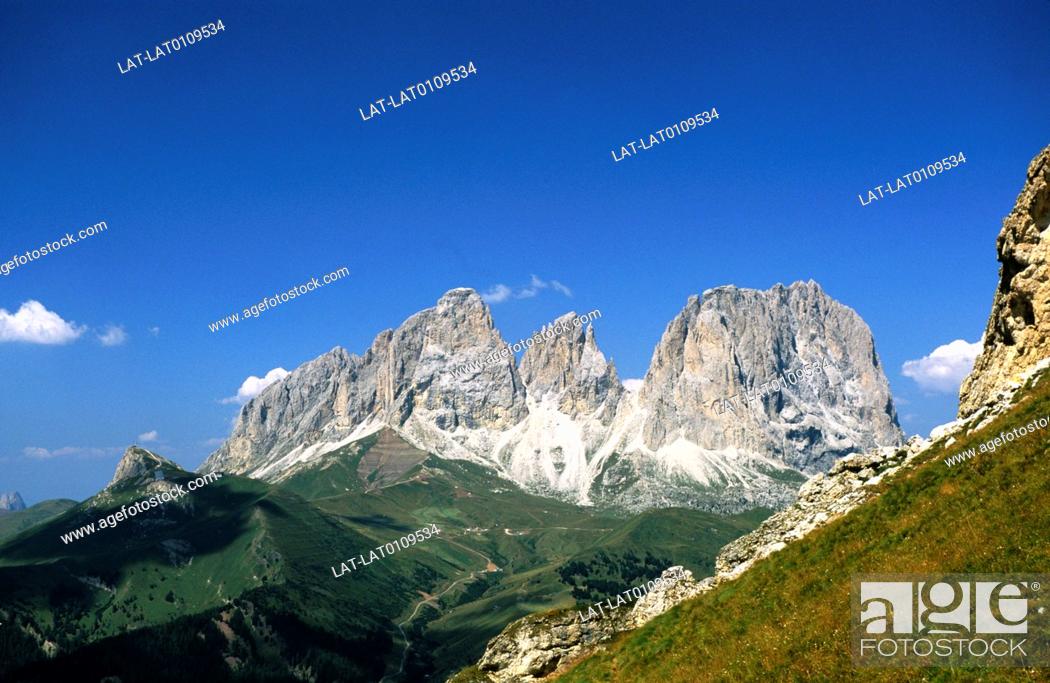 Stock Photo: Pass through the Alps, Massifs towering above green valleys.