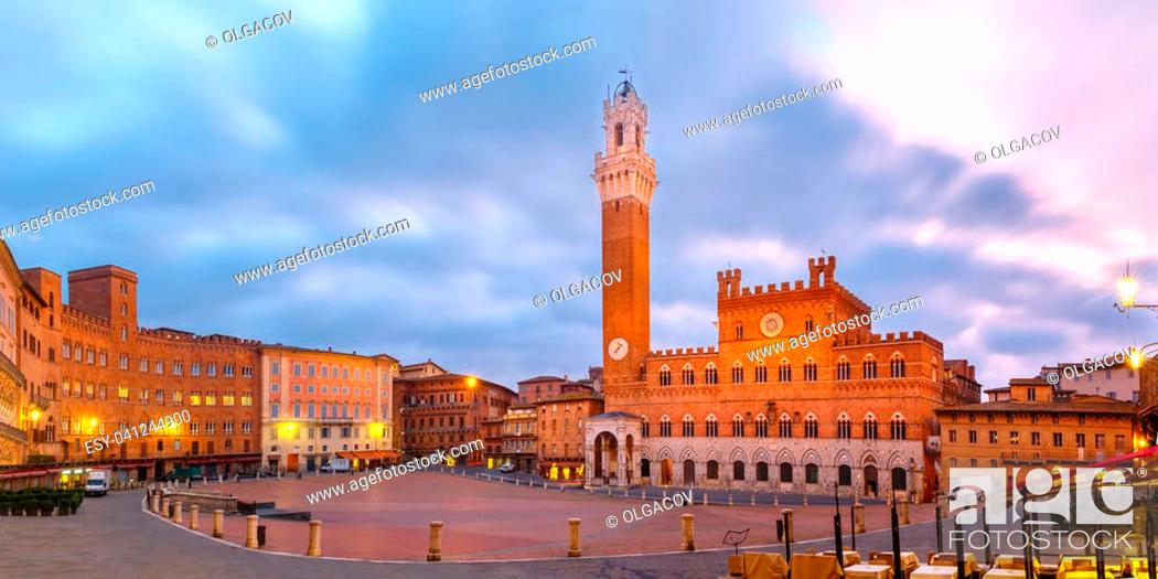 Stock Photo: Mangia Tower or Torre del Mangia towering above of the Palazzo Pubblico on Piazza del Campo in medieval city of Siena at beautiful sunrise, Tuscany, Italy.