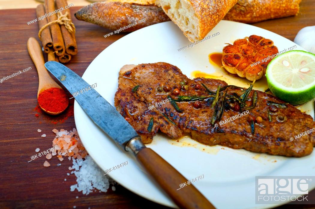 Stock Photo: Roasted grilled ribeye beef steak butcher selection.