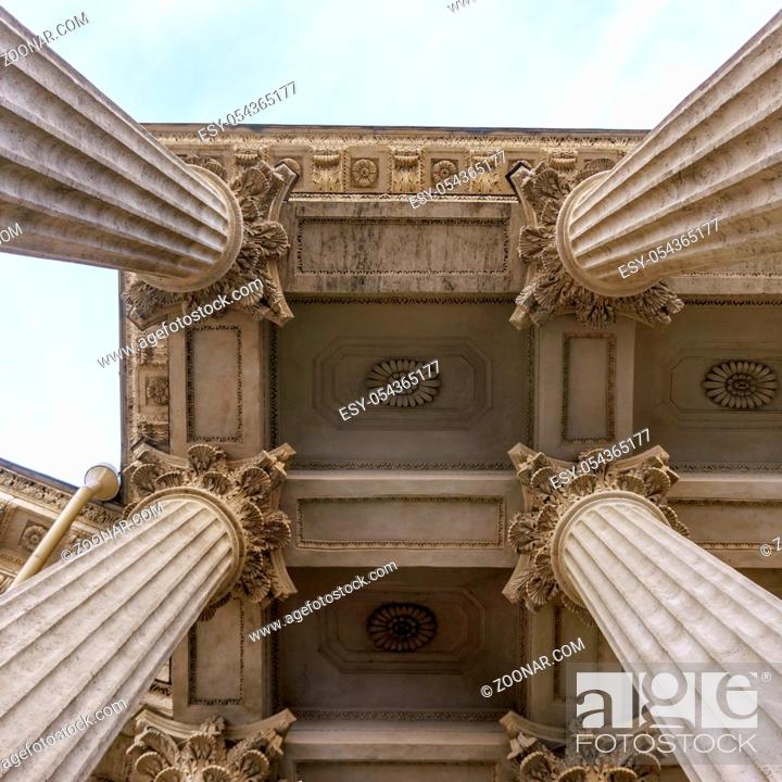 Stock Photo: Vintage Old Justice Courthouse Column. Stone column ancient classic architecture detail. Abstract view of neoclassical fluted columns bases and steps of Court.