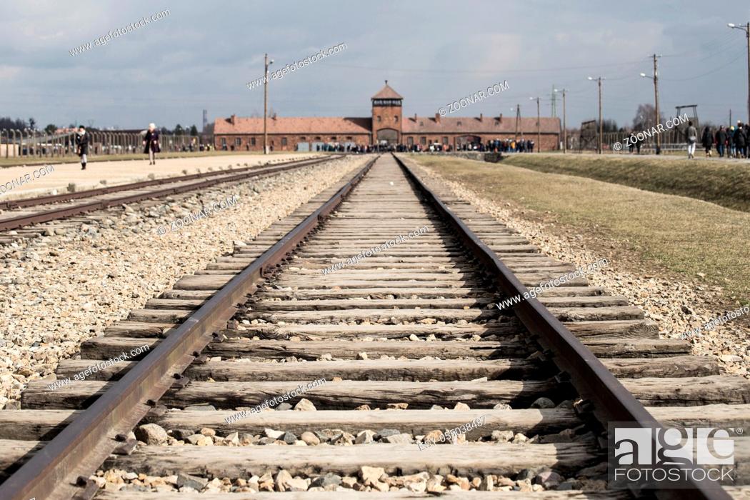 Stock Photo: Rail entrance to concentration camp at Auschwitz Birkenau KZ Poland March 12, 2019 war.